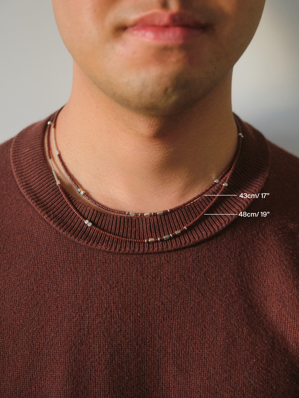 Necklace lengths shown on a model